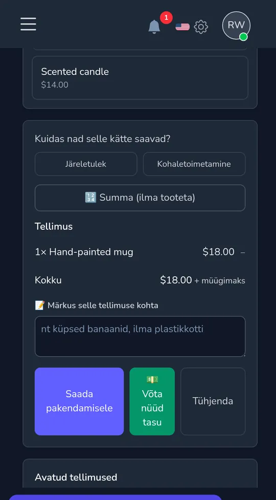 Kassa telefonis: üks käsitsi maalitud kruus, kokku, ja nupud selle pakendamiseks saatmiseks või praegu laadimiseks.